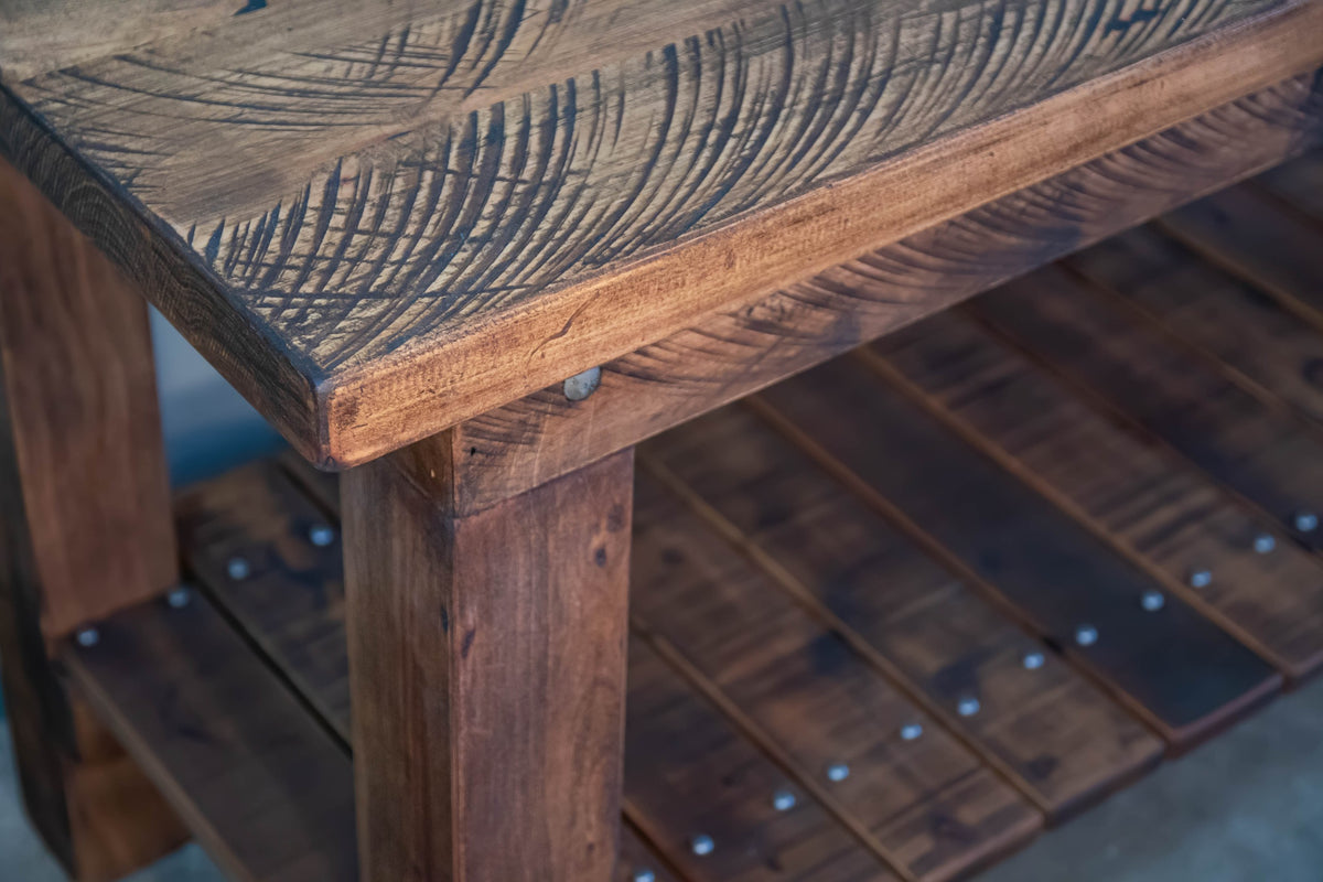 Close up of a macrocarpa table with lower shelf in Antique Brown