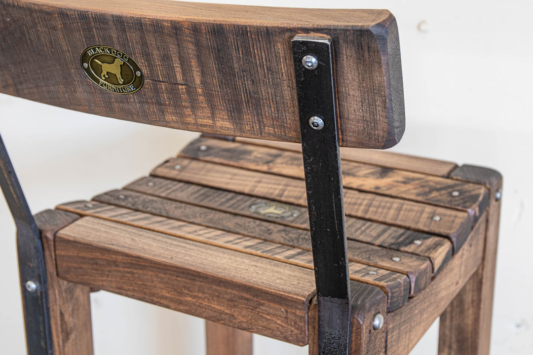 Close up of a high back stool in Antique Brown macrocarpa