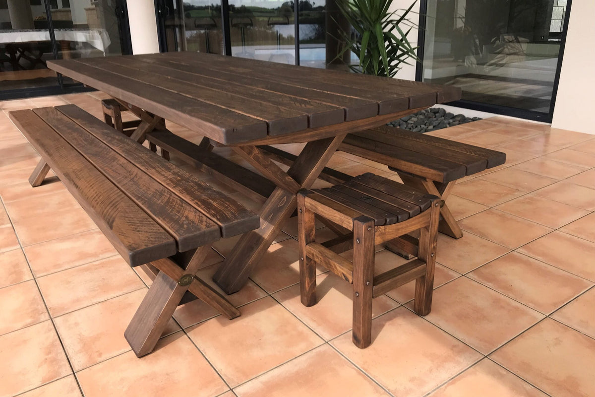 X-Leg Outdoor Forms and stool with an X-Leg table on a patio
