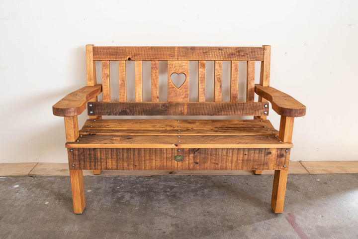 1.2m macrocarpa garden seat in Honey