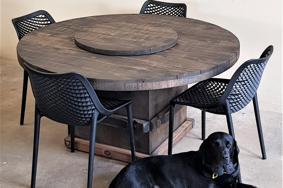 Black Bean chairs around a round Woolpress table