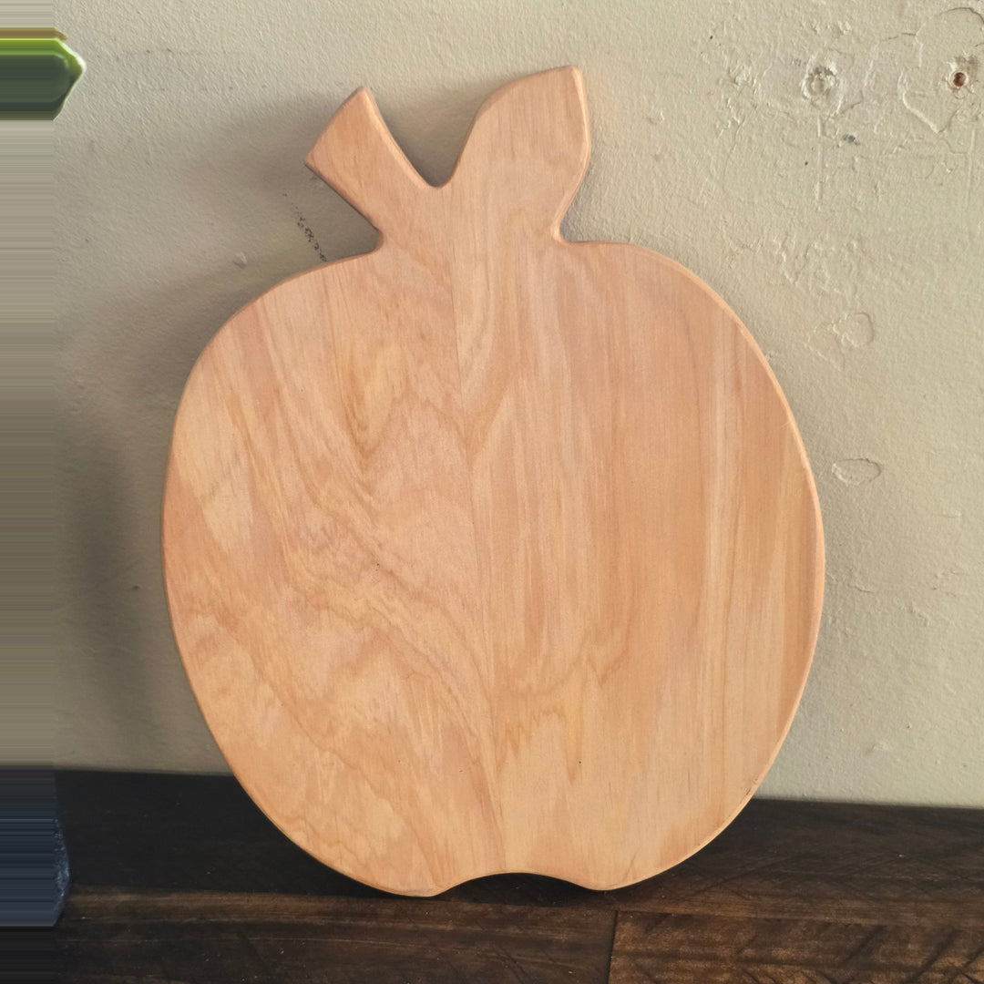 Apple shaped macrocarpa chopping board