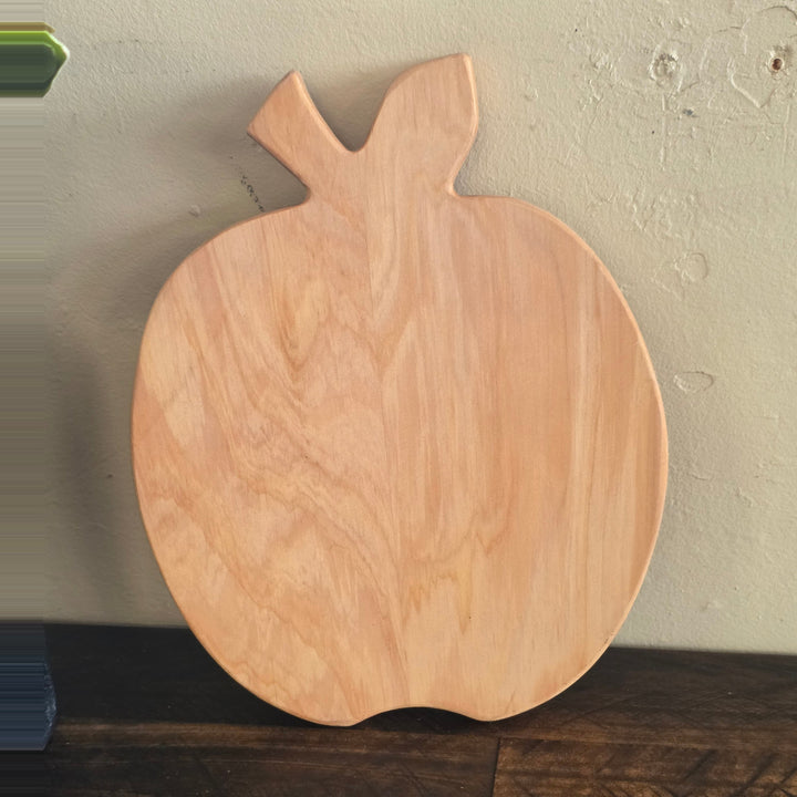 Apple shaped macrocarpa chopping board