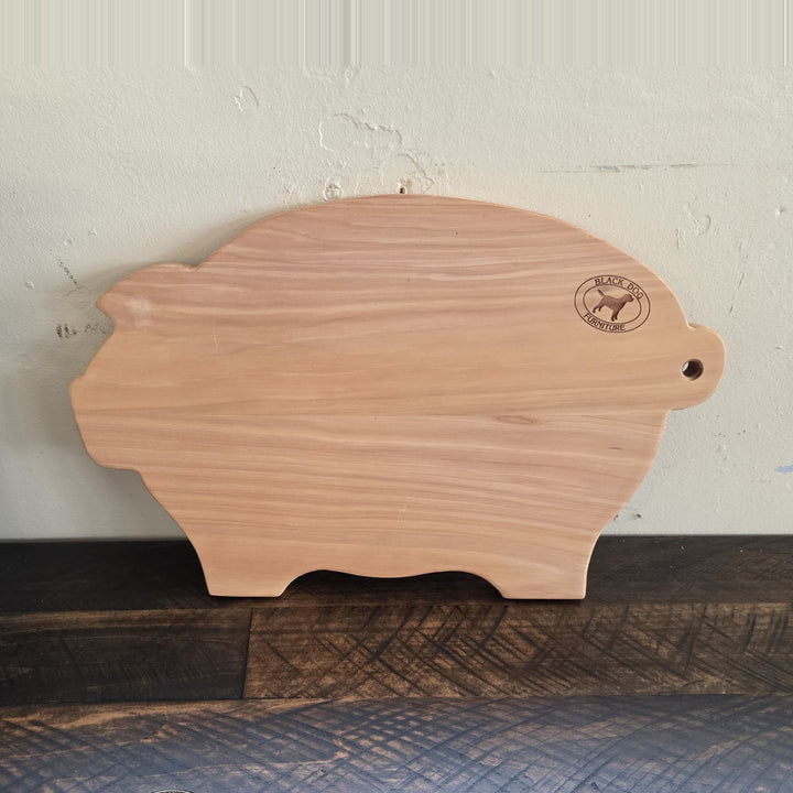 Pig shaped macrocarpa chopping board