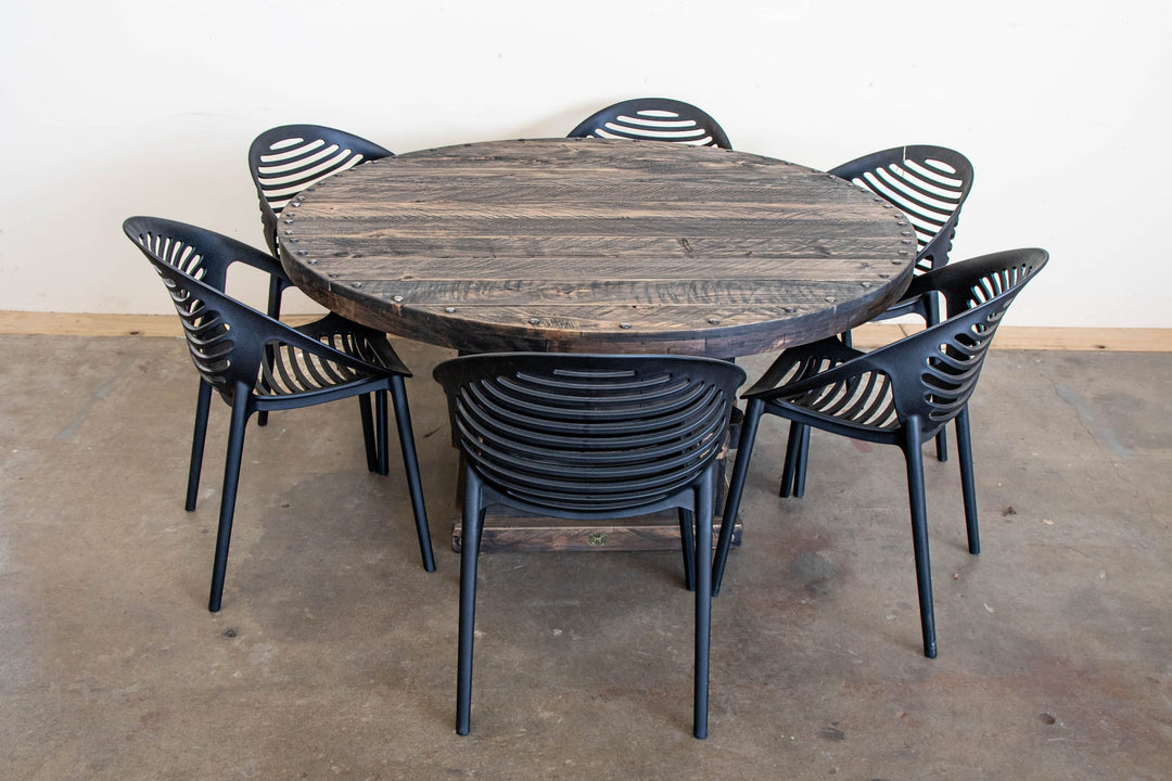 Round Woolpress outdoor table in Charcoal macrocarpa